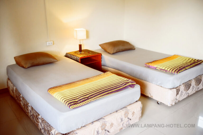 ห้องพัก โรงแรมบ้านสวนลุงอี๋ หอพัก ห้องเช่า ที่พักใกล้ศูนย์โรงพยาบาลมะเร็ง ลำปาง