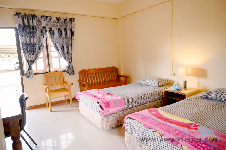 ห้องพัก โรงแรมบ้านสวนลุงอี๋ หอพัก ห้องเช่า ที่พักใกล้ศูนย์โรงพยาบาลมะเร็ง ลำปาง